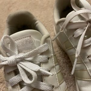 multi colored adidas sneakers